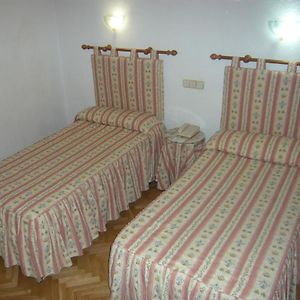 Habitación con 2 Camas Individuales